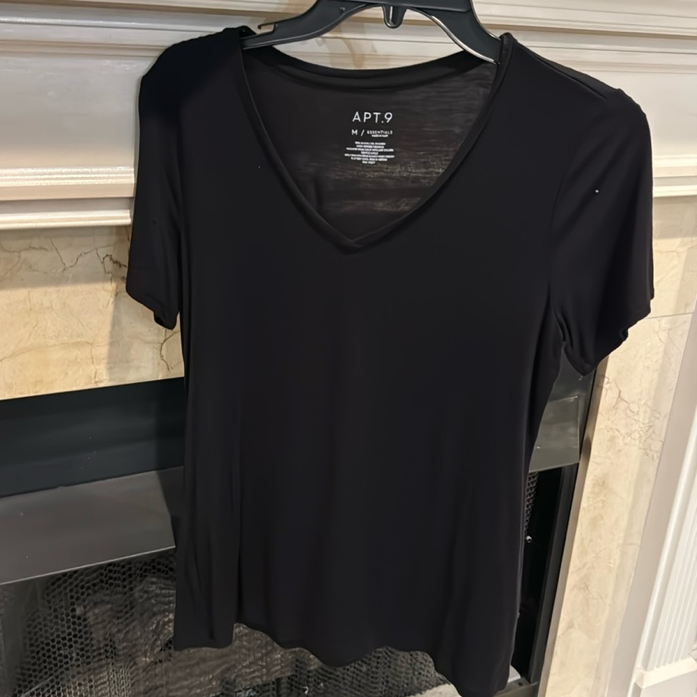 Black v neck tee. Size M. Worn several times. Listing # 702